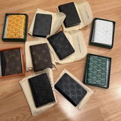 Designer wallets ( 85 Each* ) 