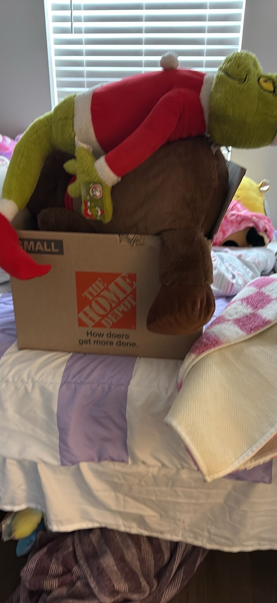 Two Christmas plushy’s and a box of old items