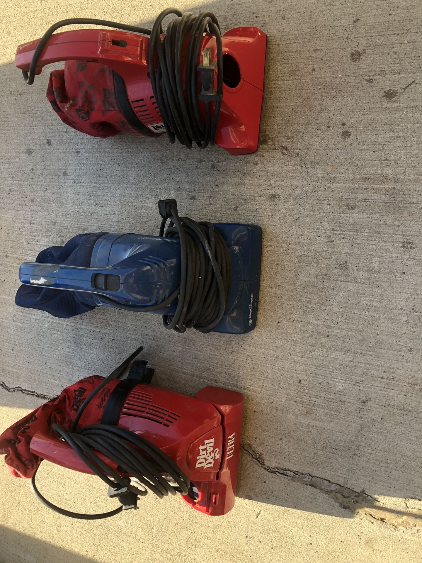 Hand- held vacuum cleaners