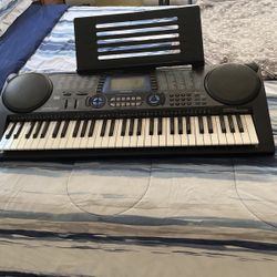  Key Board / Synthesizer And Stand 