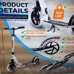 KICK SCOOTER. FOR AGES 6+. FOR KIDS TEENS AND ADULTS, MAX LOAD 240LBS FOLDABLE, 8 INCH BIG WHEELS W/ KICK STAND, 3 AD