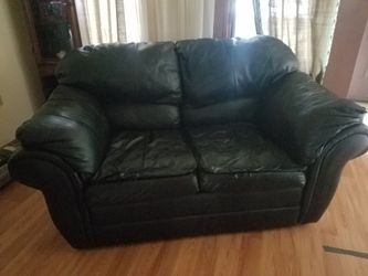 Soft leather love seat.