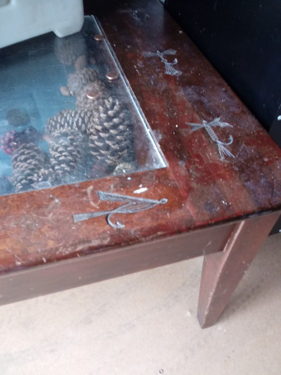 Vintage Coffee table with fishing lures carved all around it with glass display 4. " Deep very unique