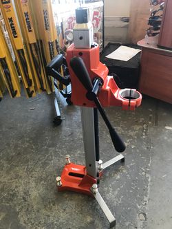 Hand Held concrete drill stand $195 only have 2 available