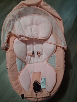 Pink baby swing