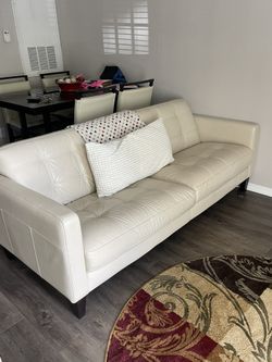 Cream Leather Over Sized Chair And Loveseat