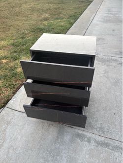 Free end table set of drawers.