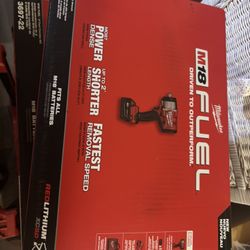 Brand new Milwaukee impact wrench with 50 battery in the box brand new