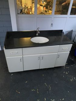 Granite Countertop With Sink/Faucet And Cabinets