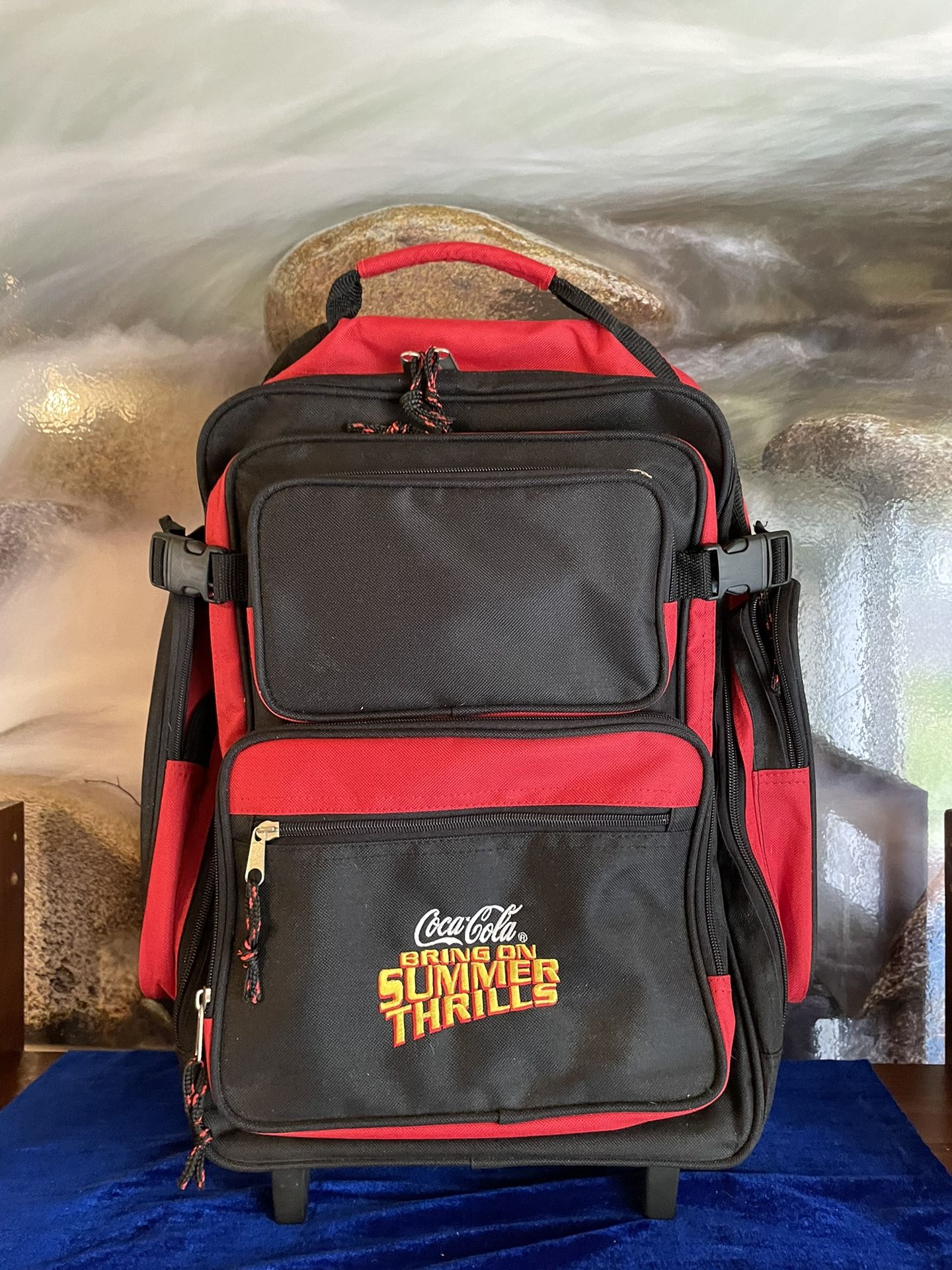 Coca Cola Bring On Summer Thrills Rolling Backpack Telescoping Handle Travel HTF. In like new condition no tags. 20in x 14in All proceeds go toward