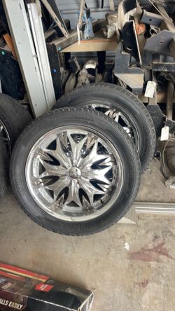 For universal Chevy tires and wheels Four universal Chevy tires and wheels