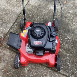 Yard Machines 300E. /. 125cc. Push Lawn Mower 