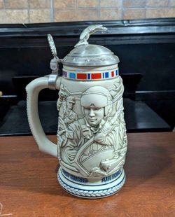 1990 Avon Tribute to the American Armed Forces Beer Stein with pewter-style lid with an eagle figurine