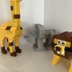 Lion  elephant and giraffe