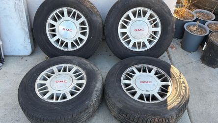GMC Sonoma, Jimmy, S10, Blazer 4x4 Stock 15 Inch aluminum wheels with old tires, Only fits 4wd