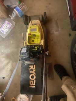 Podadora de bateria marca ryoby con 2 batterias y su cargador