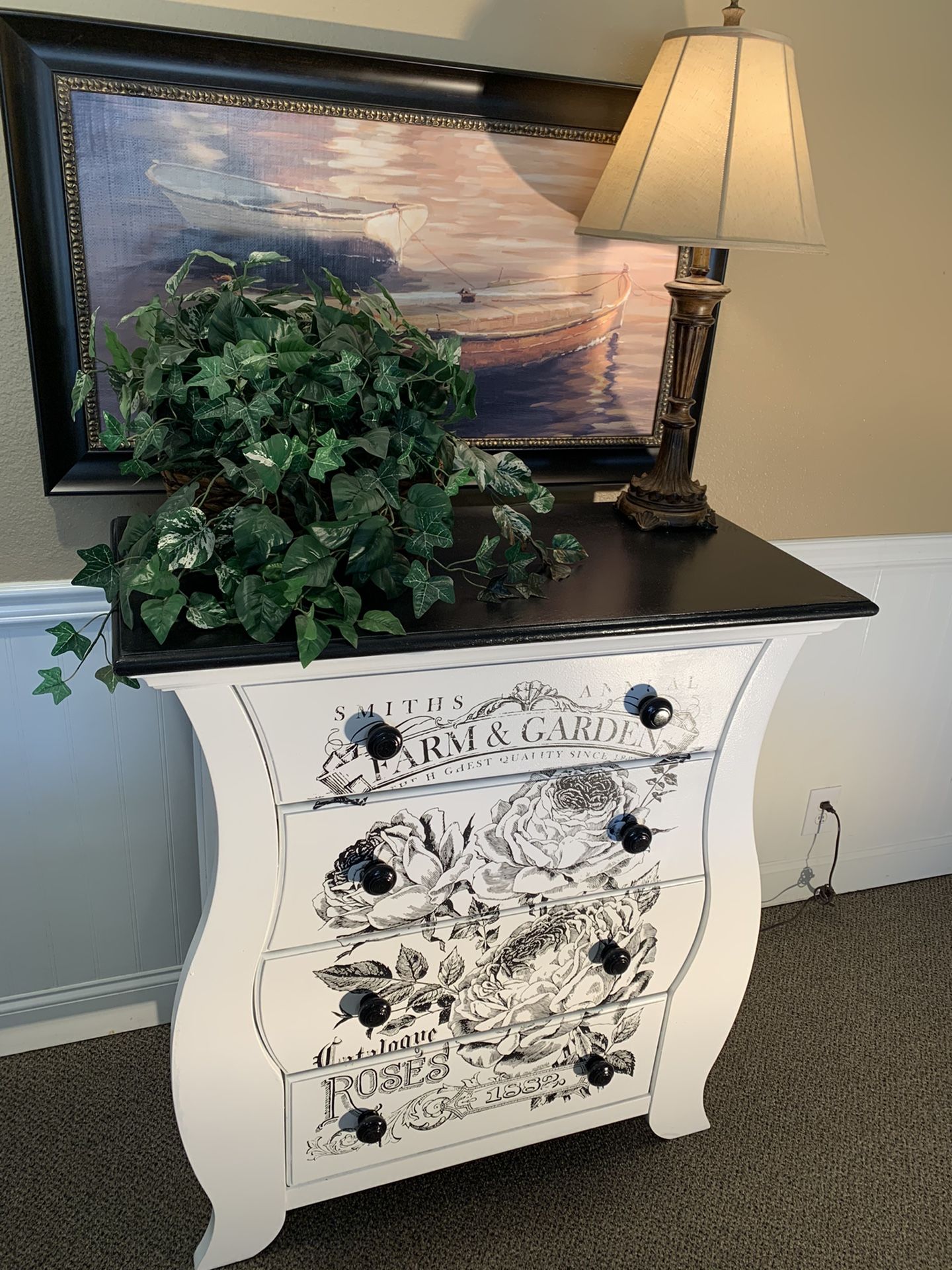 Refurbished dresser. This dresser is made of solid wood. It’s really a strong dresser. I just refurbished it with a new paint job and a rose transfer