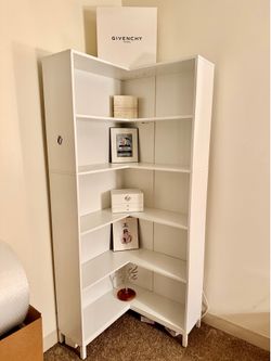 White corner bookshelf