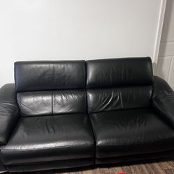 German Leather Black Powered Recliner & 2 Seater Powered Recliner Couch  $2600 Retail Price $ 500 Or Best Offer! Needs To Go!