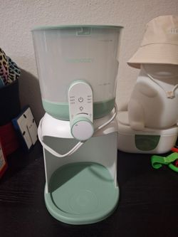 Momcozy water warmer for bottles
