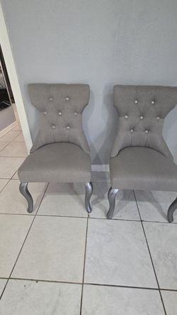 2 fabric and crystal dining chairs