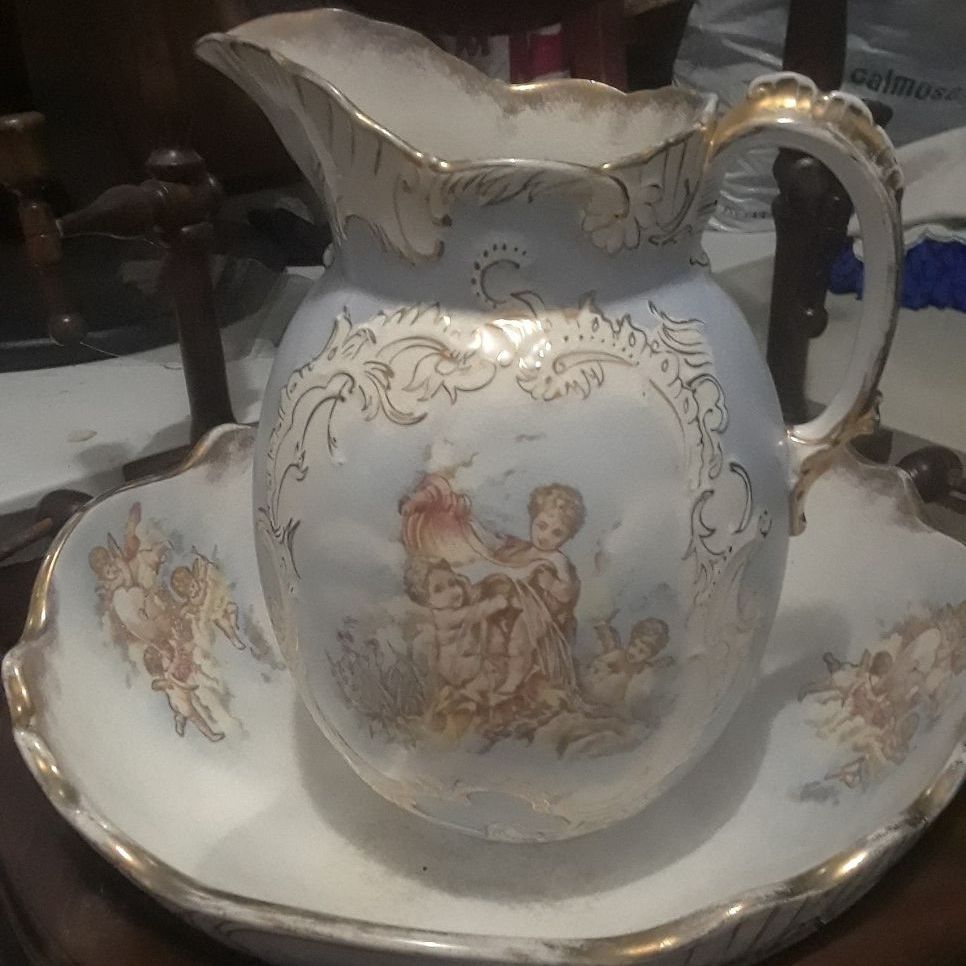 Antique table with bowl and pitcher