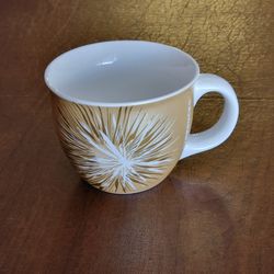 Starbucks @2014 Gold STARBURST Large Cafe Coffee Cup Mug 14oz . 
Pre-owned, very good shape, no chips or cracks., please see photos for 
details. 
