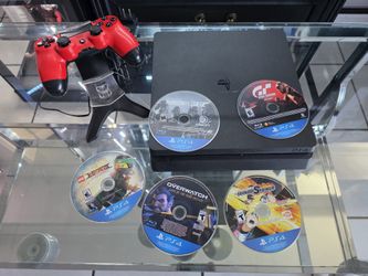 PLAYSTATION 4 SLIM CON SU BASE DE CARGA Y CONTROL + 5 JUEGOS A ELEGIR 