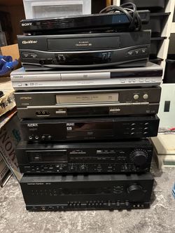 Several stereo/VHS/DVD components