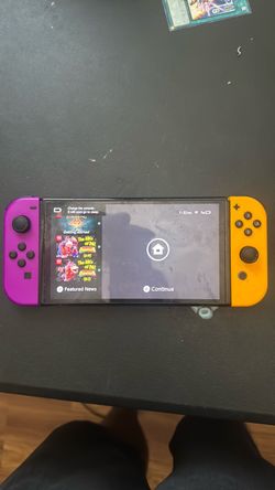 Nintendo switch oled /docking station and Mario kart wheel