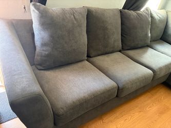Grey Sectional sofa with bed