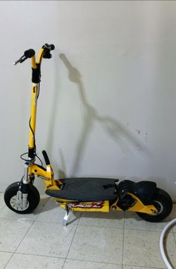 Bladez XTR Comp ll full Suspension Electric Old School Scooter  Battery Upgrade goes up to 30mph Good Working Condition Asking $250 Firm on Price