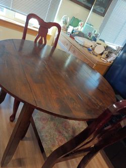 Selling the table only and two antique chairs. Originally was purchased as a set from the cannery in sumner 20 years ago,