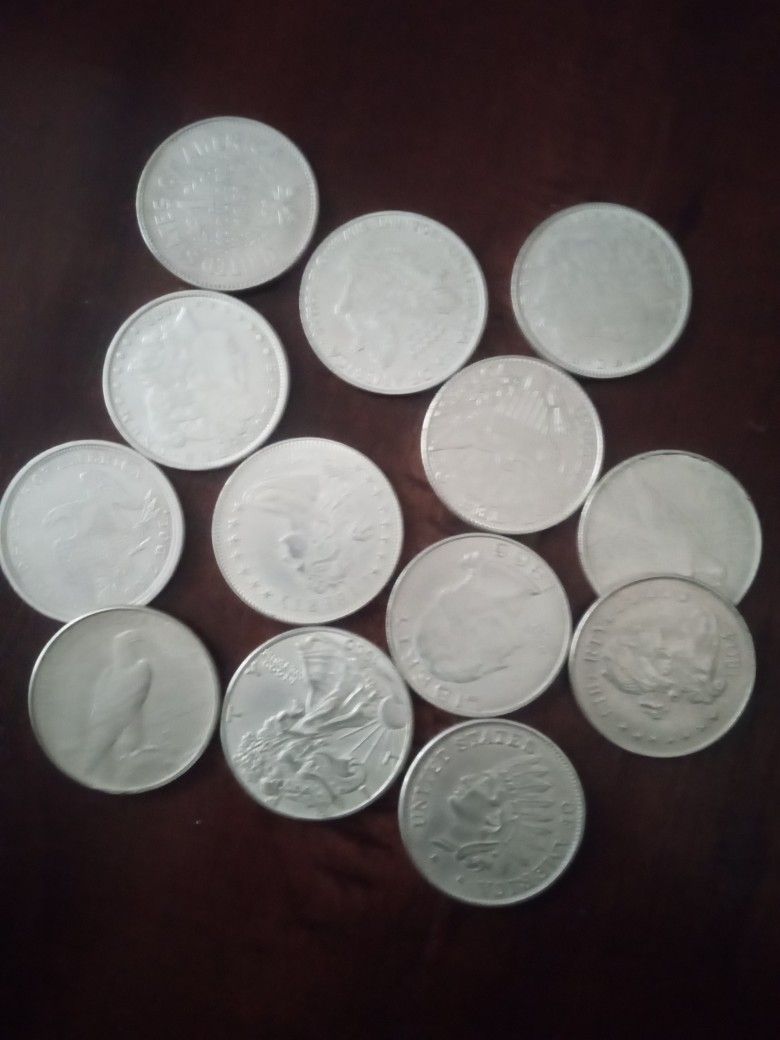 13 One Dollar Silver