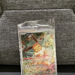 Raw Prismatic Evolutions Eevee Promo with Card Dividers