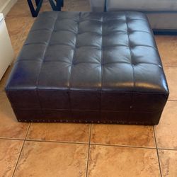 Brown leatherette Ottoman