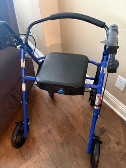Blue walker with seat