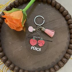 Peach Keychain with Pink Tassel