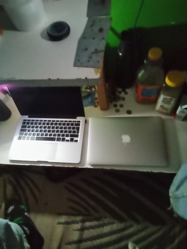 2 MacBook Laptops