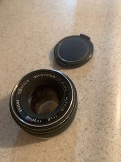 49mm Olympus lens and cap