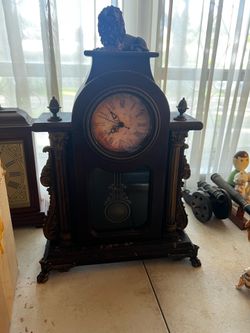 Ornate Decorative Mantel Clock with Lion Finial