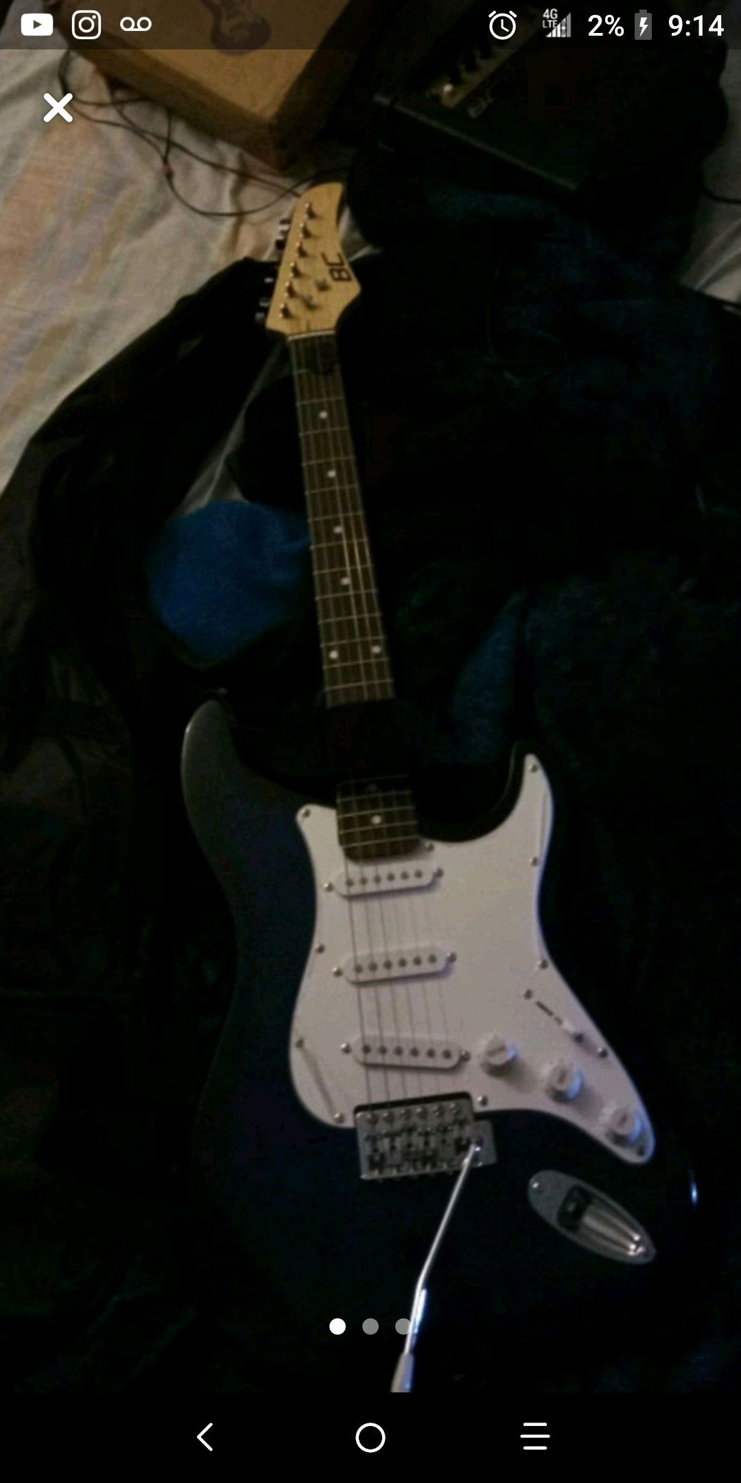 Electric guitar with amp perfect condition for sale or trade for game system