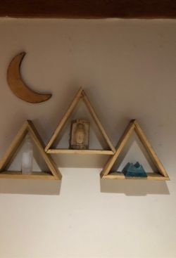 3 pyramid wooden shelves