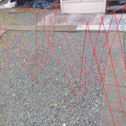 Three Red Stands I Don't Know What They're For But If You Do Here They Are