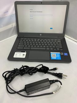 HP Chromebook with its original charger -Refurbished.
