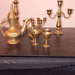 VINTAGE DOLLHOUSE MINIATURE, SOLID BRASS TEAPOT AND CUPS, AND CANDLESTICK HOLDERS .
