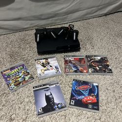 PS3 W/ 4 Games And 2 Controllers