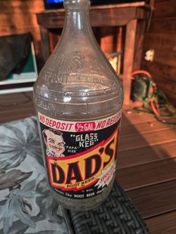 Large vintage Dad's root beer bottle