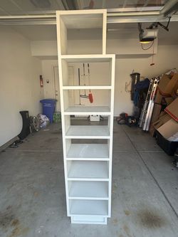 Vertical storage/shoe rack. 81.5 inches tall/18.75 wide/13.5 deep