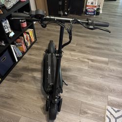 EMOVE Cruiser 52V 1600W Dual Suspension - Long Range Electric Scooter